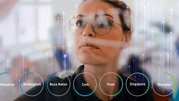 A woman seriously looking at a display