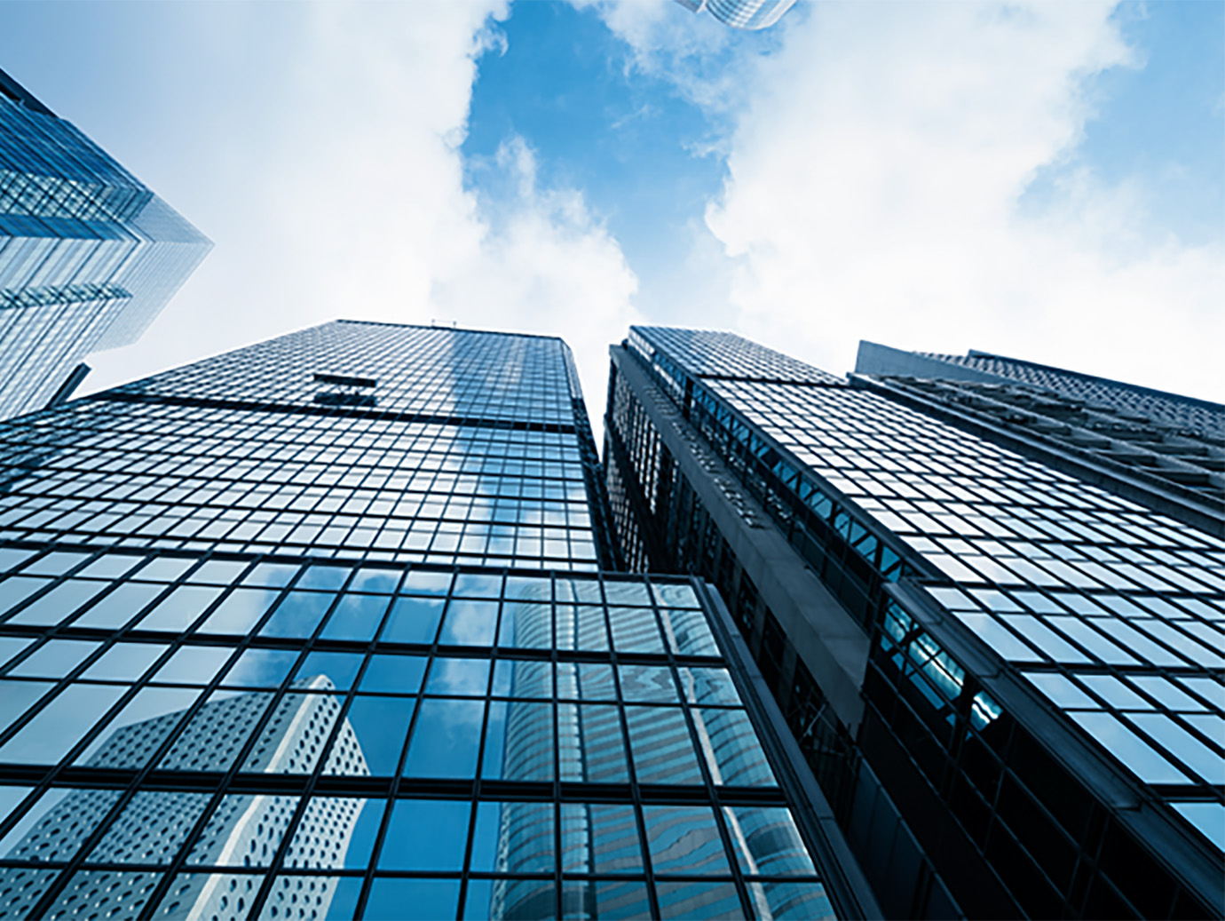 Frog's eye view of skyscrapers against the sky