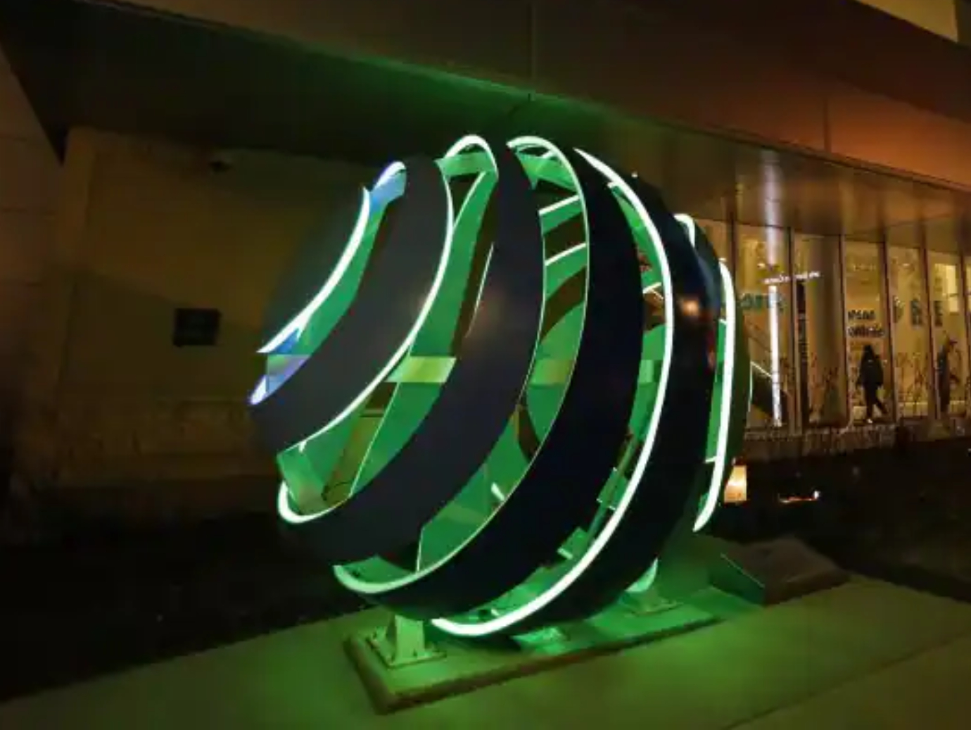 The Johnson Controls Sculpture located outside Fiserv Forum during nighttime
