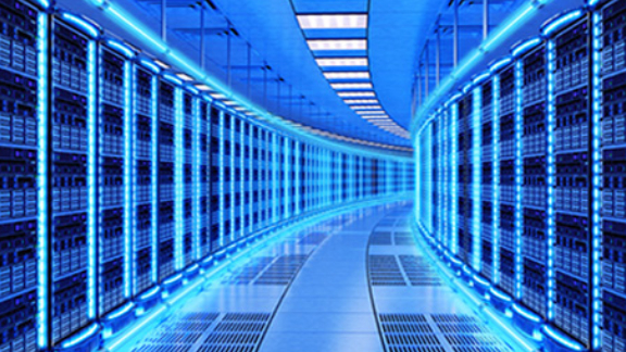 Hallway in a server room with racks on either side