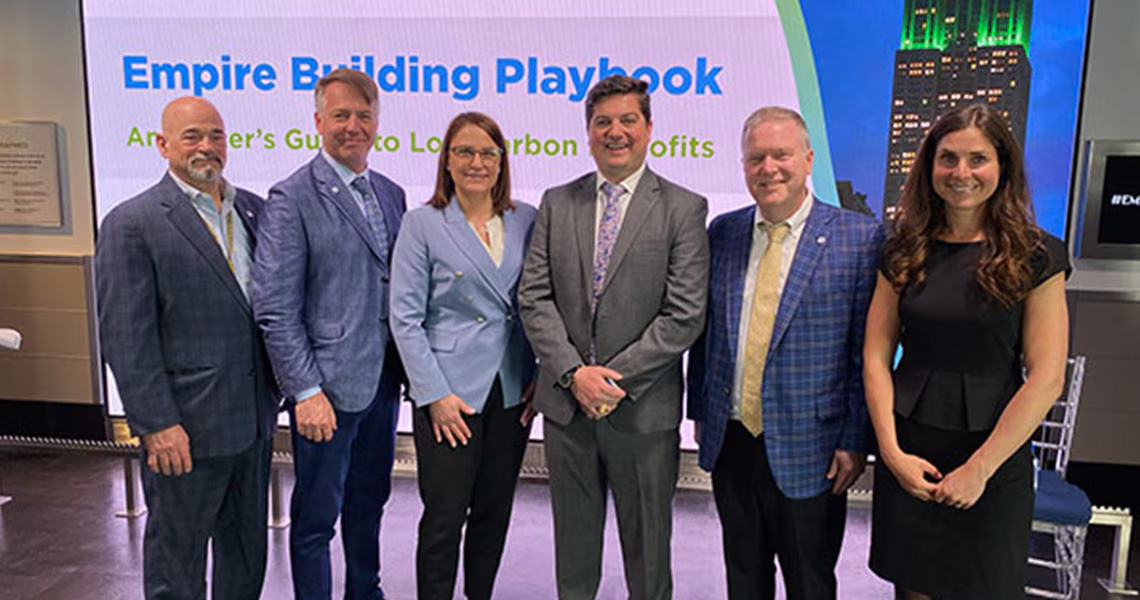 A group of people at an event at the Empire State Building