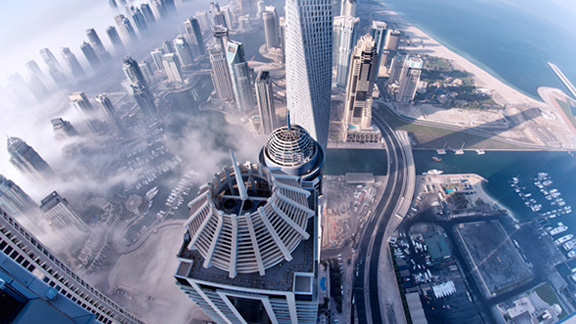 Aerial view of modern city skyline during evening