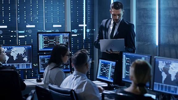 Group of data scientists working on codes in an office room