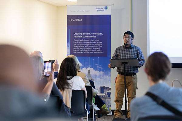 Paul Arciba, a HACC student, speaks to Johnson Controls and community leaders and fellow HACC students and teachers.