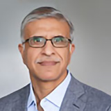 Headshot of Seetarama (Swamy) Kotagiri, Chief Executive Officer, Magna International