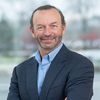 Headshot of John Donofrio, Executive Vice President and General Counsel, Johnson Controls