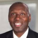 Headshot of W. Roy Dunbar, Retired CEO and Chairman Network Solutions