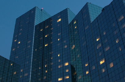 Glass buildings against the evening sky