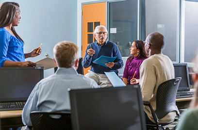 People in an office having a discussion