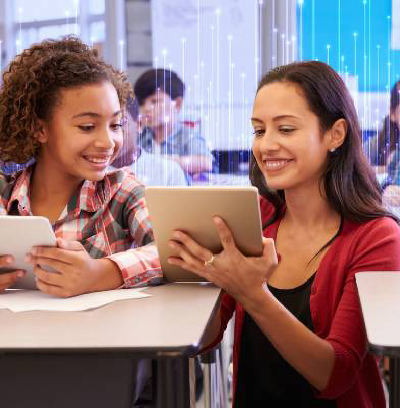 A schoolteacher showing a tablet to one of her students in a classroom, overlaid with OpenBlue graphics