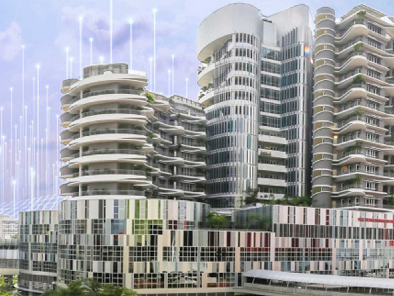 Exterior of a large hospital building at daytime, with OpenBlue graphics overlaid behind