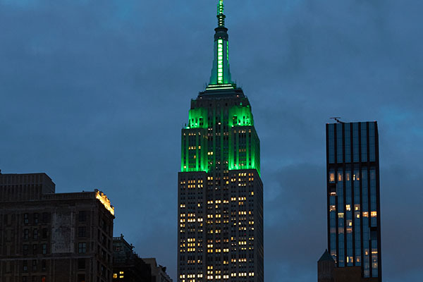 The Empire State Building with green lighting